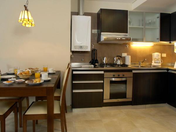 Village Condo : photo 3 de la chambre appartement (3 adultes)