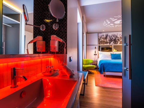 Pestana CR7 Lisboa : photo 1 de la chambre hébergement d’angle supérieur cr