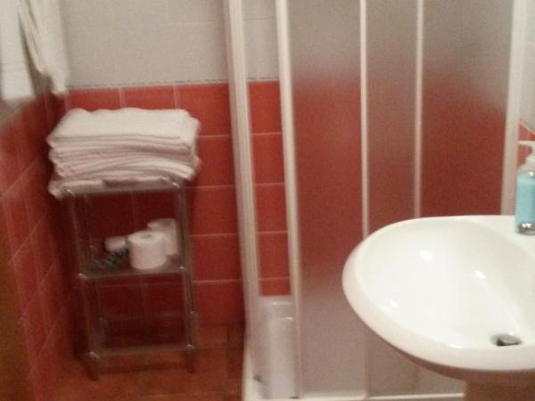 Villa Sorrentina : photo 4 de la chambre chambre deluxe (2 adultes + 1 enfant)