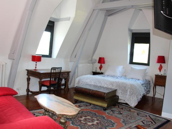 Propriété La Claire : photo 3 de la chambre chambre triple - vue sur jardin