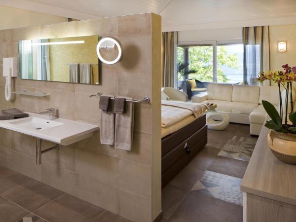 Boutique Hotel Albergo Brione : photo 4 de la chambre suite junior supérieure avec balcon