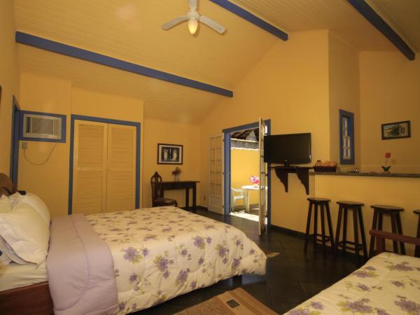 Pousada Repouso do Guerreiro : photo 3 de la chambre appartement avec patio