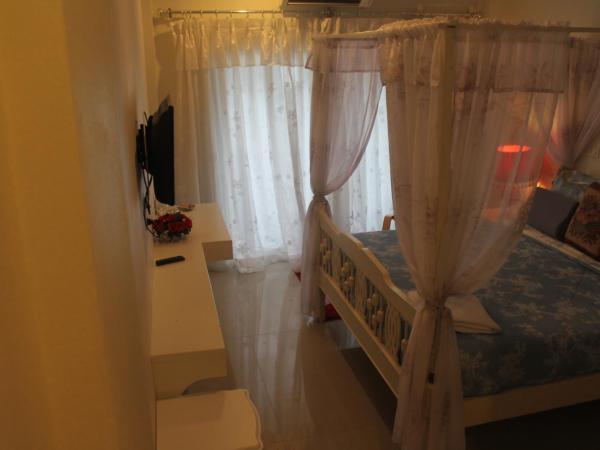 Huen Chan Thip : photo 3 de la chambre chambre double deluxe avec balcon