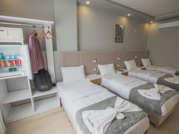 Express İnci Hotel : photo 4 de la chambre chambre quadruple deluxe