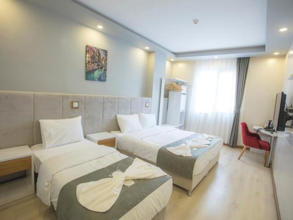 Express İnci Hotel : photo 1 de la chambre chambre triple deluxe