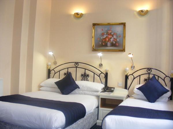 Mermaid Suite Hotel : photo 2 de la chambre chambre triple