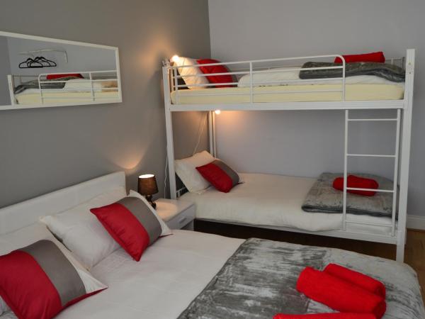 Old Trafford Guest House : photo 3 de la chambre chambre quadruple