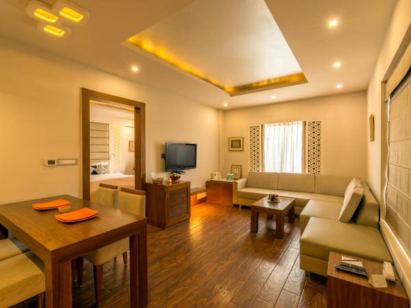 Howard Plaza The Fern, Agra : photo 4 de la chambre suite noisette