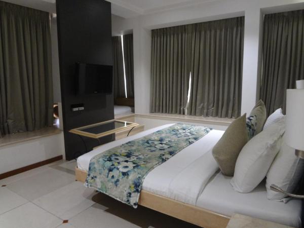 Hotel Suncity Apollo, Colaba : photo 10 de la chambre chambre deluxe double ou lits jumeaux