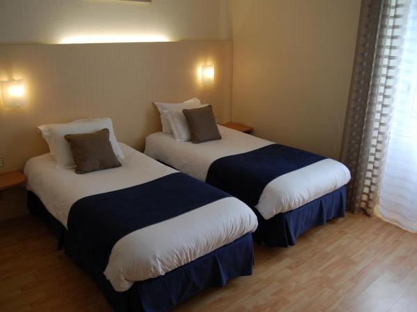 Le Bretagne - Hôtel Spa & Sauna : photo 1 de la chambre chambre lits jumeaux confort