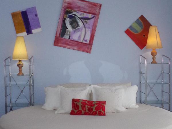 BellaVita City Faro : photo 1 de la chambre suite lit king-size avec balcon