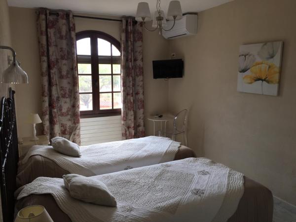 Logis Hôtel Le Manoir & Lounge : photo 1 de la chambre chambre lits jumeaux