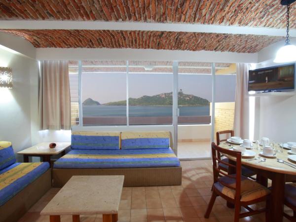 Las Flores Beach Resort : photo 1 de la chambre suite with kitchenette - sea view