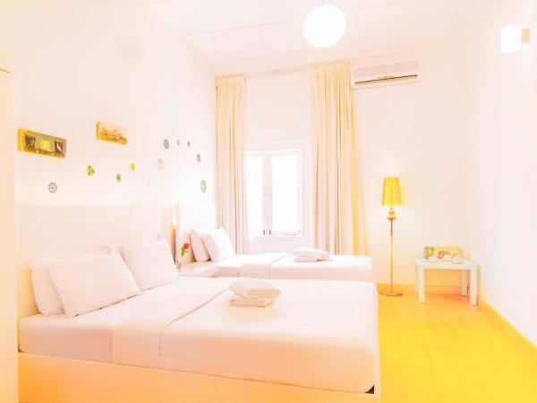 Chulia Heritage Hotel : photo 1 de la chambre chambre triple avec salle de bains commune