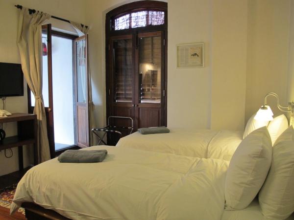 Ren I Tang Heritage Inn : photo 9 de la chambre chambre avec balcon