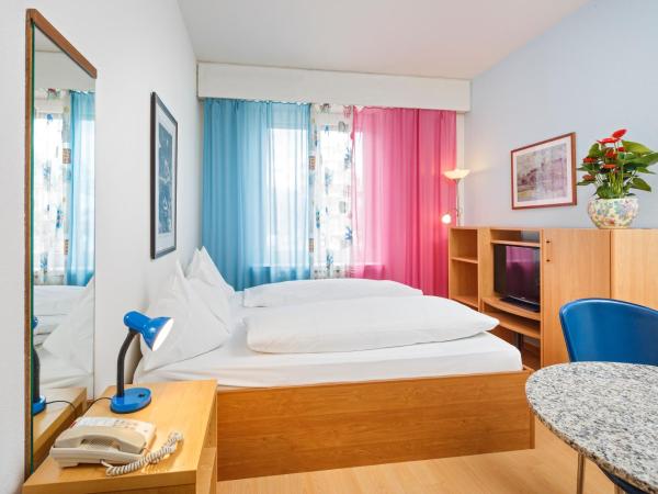 Residence zum Löwen : photo 9 de la chambre chambre double avec salle de bains commune