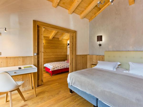 Hotel Alpina : photo 1 de la chambre chambre triple