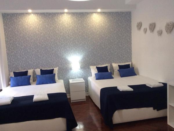 4U Lisbon IV Guesthouse Airport : photo 1 de la chambre chambre familiale deluxe