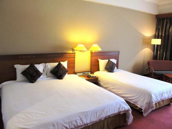 Hotel Grand Continental Kuching : photo 3 de la chambre chambre familiale deluxe