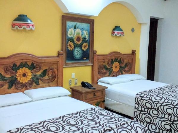 Suites Flamboyanes : photo 5 de la chambre chambre double avec 2 lits doubles