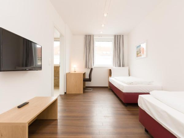 Vienna Stay Apartments or Rooms 1050 : photo 3 de la chambre chambre lits jumeaux