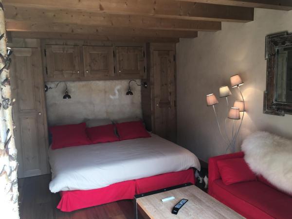 Chalet Mine de rien : photo 2 de la chambre chambre double ou lits jumeaux deluxe – vue sur jardin