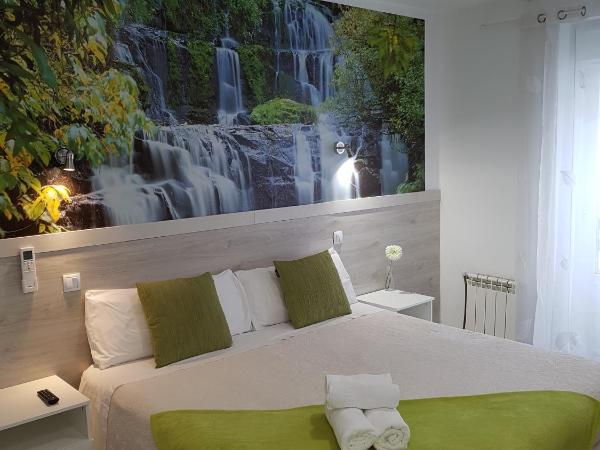 Hostal Madrid Star : photo 1 de la chambre chambre lit king-size ou lits jumeaux supérieure