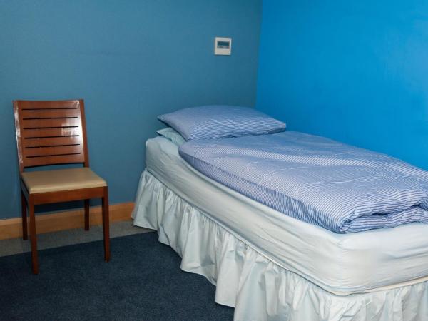 Russell Scott Backpackers Hostel : photo 1 de la chambre chambre simple supérieure
