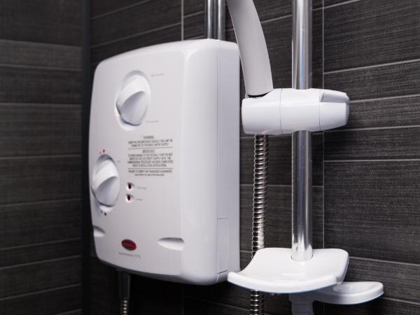 Russell Scott Backpackers Hostel : photo 5 de la chambre chambre triple supérieure avec salle de bains commune