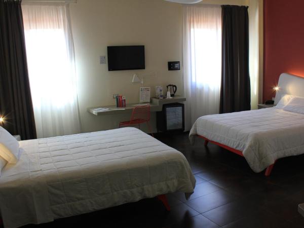 Ibis Styles Palermo President : photo 10 de la chambre chambre supérieure avec 2 lits doubles