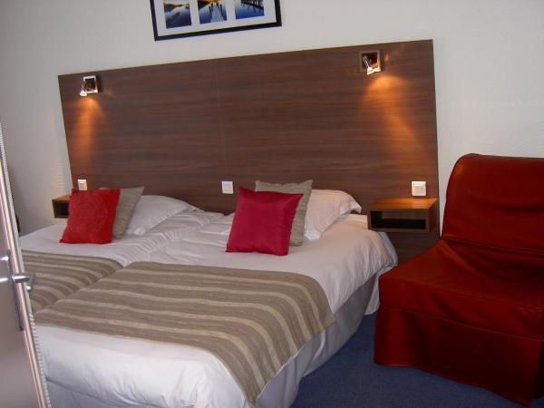 Cit'Hotel Du Port Rhu : photo 1 de la chambre chambre lits jumeaux avec lit d’appoint - 301