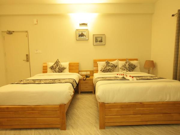 Grand Cascade Chennai : photo 4 de la chambre chambre lit king-size