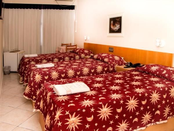 Hotel Pouso Real : photo 2 de la chambre chambre triple standard