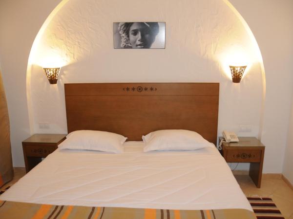 Hotel Menara : photo 5 de la chambre chambre triple