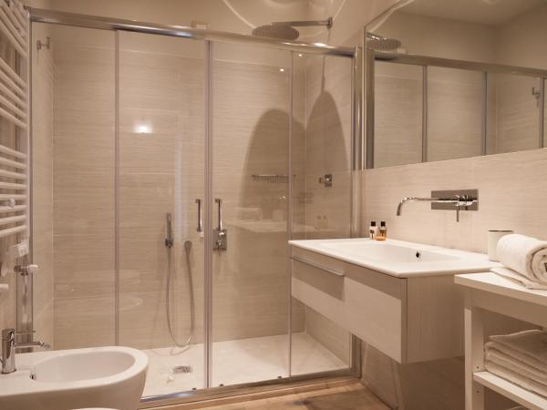 Il Leone Blu : photo 6 de la chambre chambre quadruple supérieure 