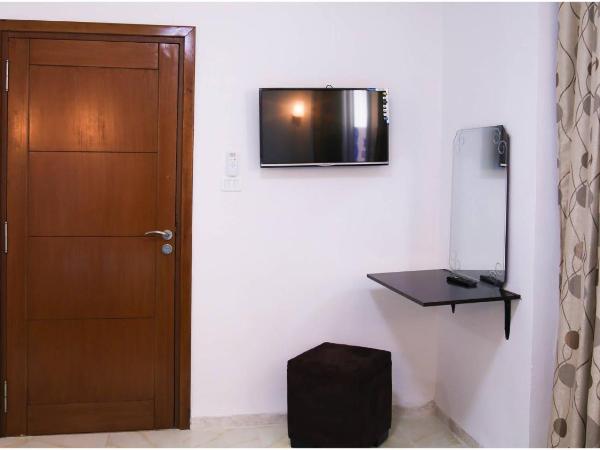 Hotel Métropole Résidence : photo 1 de la chambre chambre quadruple avec salle de bains privative