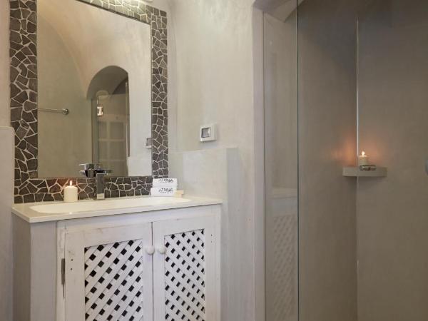 Atrina Canava 1894 : photo 8 de la chambre suite Élégante - vue sur caldera