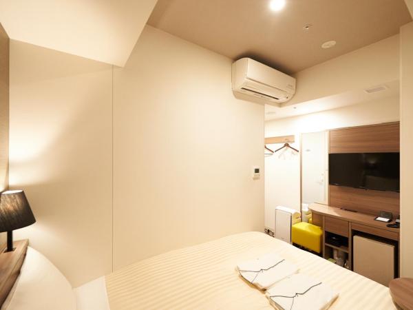 Sotetsu Fresa Inn Ginza-Nanachome : photo 1 de la chambre chambre attenante - non-fumeurs