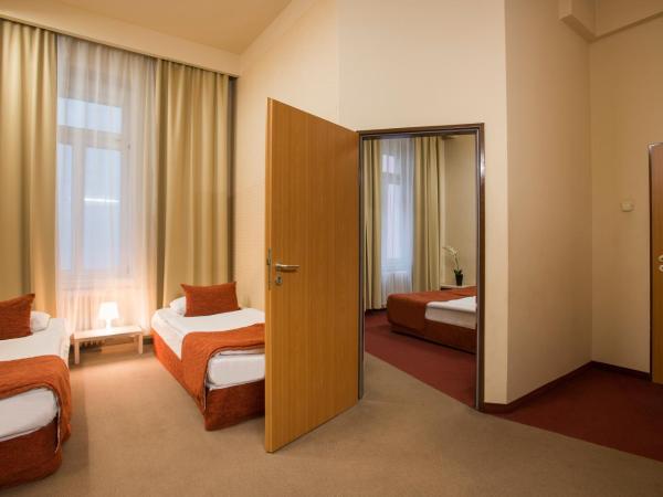 Star City Hotel : photo 1 de la chambre chambre familiale