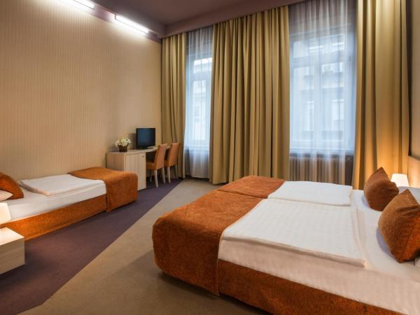 Star City Hotel : photo 1 de la chambre chambre triple