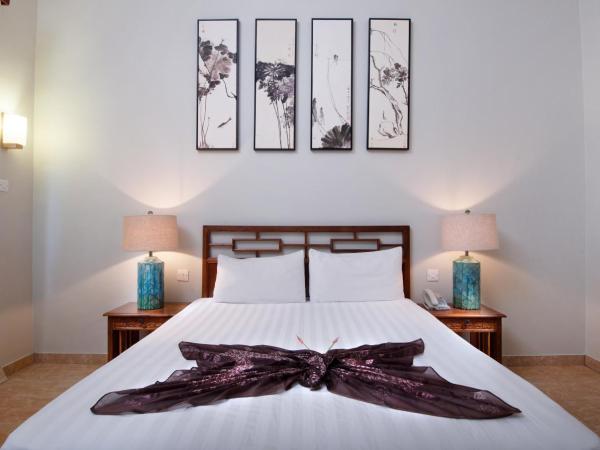 Le Palmiste Resort & Spa : photo 4 de la chambre chambre standard - vue sur piscine ou jardin