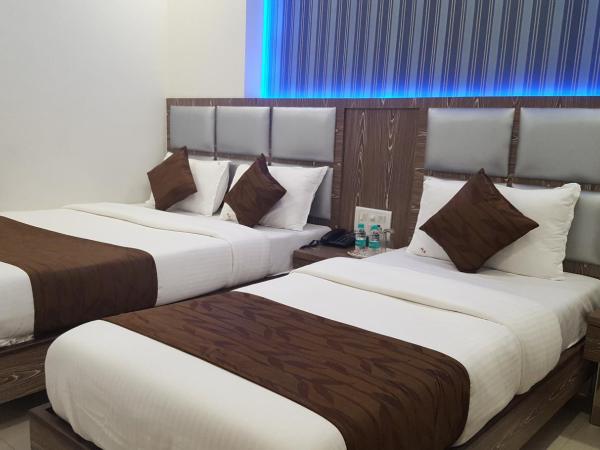 Hotel Sanjary Palace : photo 5 de la chambre chambre triple deluxe