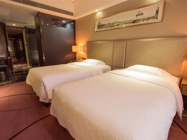 La Perle International Hotel - Free shuttle between hotel and Exhibition Center during Canton Fair & Exhibitor registration Counter : photo 4 de la chambre chambre lits jumeaux supérieure