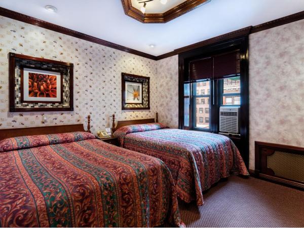 Hotel 31 Extended Stay : photo 7 de la chambre chambre double avec 2 lits doubles et salle de bains privative