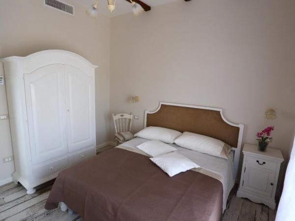 Ambrosio Relais : photo 7 de la chambre chambre triple avec terrasse