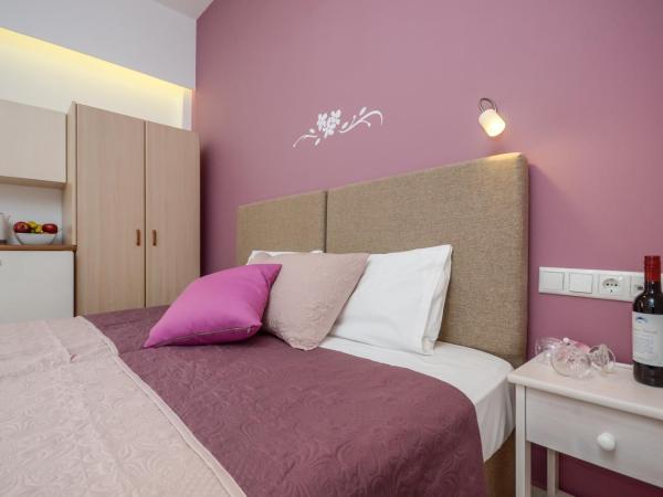 Panormos Hotel and Studios : photo 6 de la chambre chambre lits jumeaux deluxe