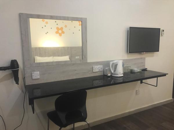 Tambun Inn Hotel : photo 6 de la chambre chambre triple supérieure