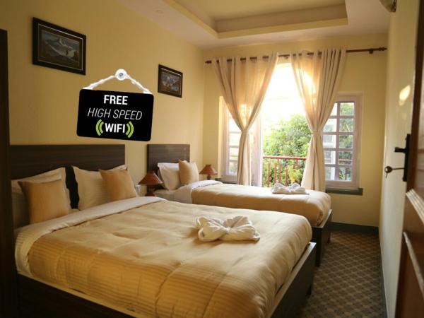 Bed and Breakfast Thamel : photo 1 de la chambre chambre triple avec salle de bains privative séparée