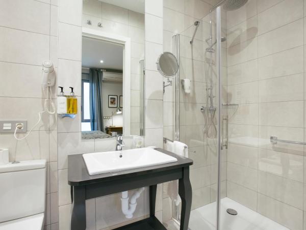 Legazpi Doce Rooms & Suites : photo 3 de la chambre chambre double ou lits jumeaux Économique