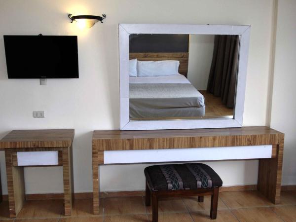 Hotel Universo : photo 4 de la chambre suite avec 2 lits doubles